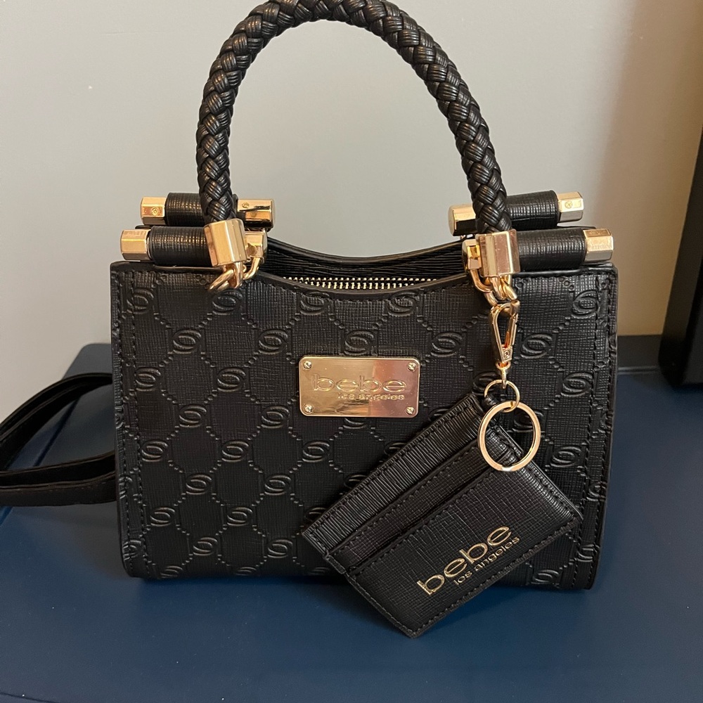 Black and gold BEBE BRAND NEW purse